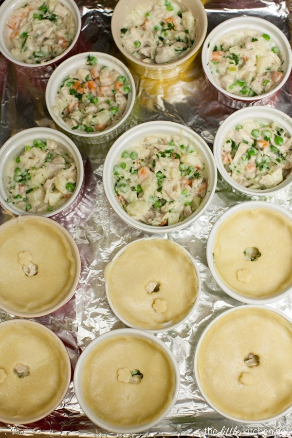 Premium Photo Homemade hearty kurnik pie with chicken potatoes and rice on parchment vertical view