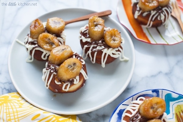 Doughnuts topped with Grilled Bananas, Cream Cheese Icing and Nutella from thelittlekitchen.net