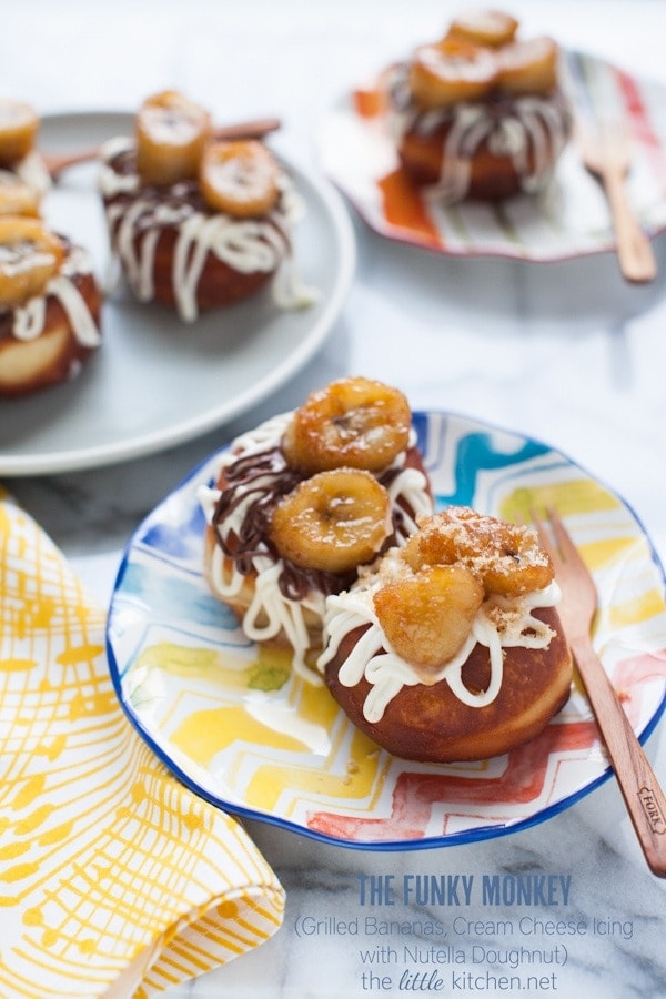 Doughnuts topped with Grilled Bananas, Cream Cheese Icing and Nutella from thelittlekitchen.net