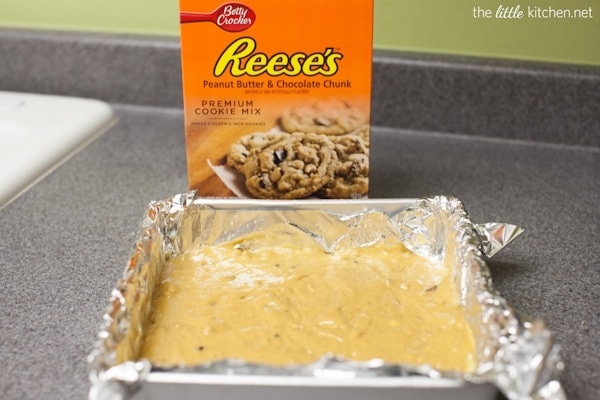 Peanut Butter & Chocolate Chunk Snack Cakes with Peanut Butter Frosting from thelittlekitchen.net