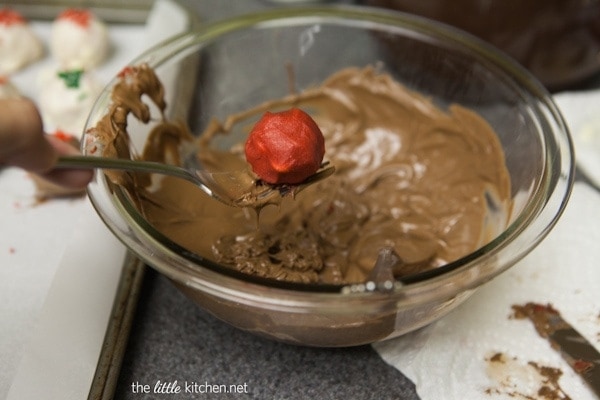 Red Velvet White Chocolate Chip Cookie Dough Truffles from thelittlekitchen.net