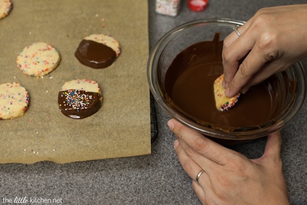 Dark Chocolate Dipped Funfetti Shortbread Cookies from thelittlekitchen.net