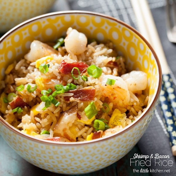 Such an easy fried rice recipe and the best ever...with a secret ingredient that makes it just like your favorite take out fried rice! Bacon and Shrimp Fried Rice from The Little Kitchen thelittlekitchen.net