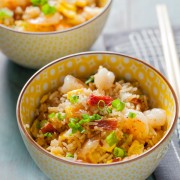 Such an easy fried recipe and the best ever...with a secret ingredient that makes it just like your favorite take out fried rice! Bacon and Shrimp Fried Rice from The Little Kitchen thelittlekitchen.net