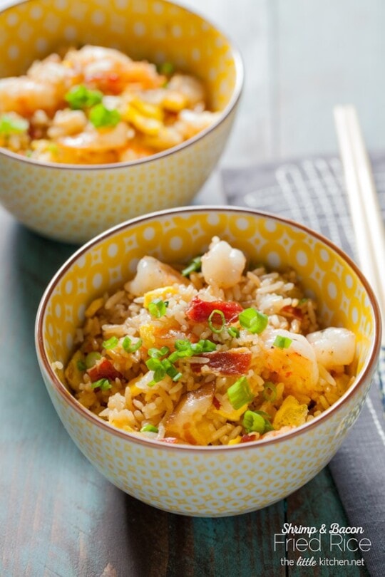 Such an easy fried recipe and the best ever...with a secret ingredient that makes it just like your favorite take out fried rice! Bacon and Shrimp Fried Rice from The Little Kitchen thelittlekitchen.net