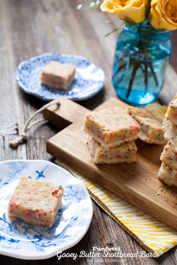 These bars are so gooey and perfect...the sprinkles are a must! Funfetti Gooey Butter Shortbread Bars from thelittlekitchen.net