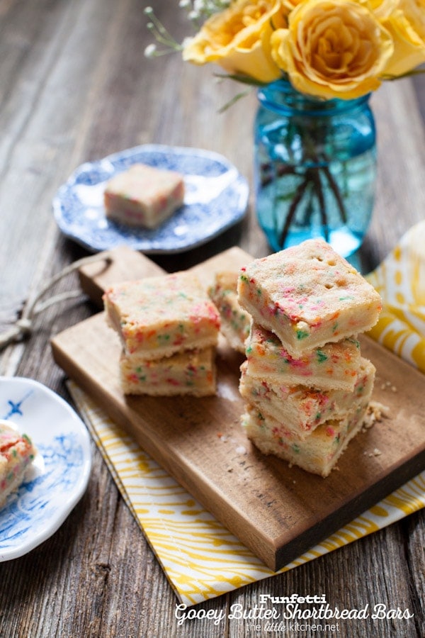 These bars are so gooey and perfect...the sprinkles are a must! Funfetti Gooey Butter Shortbread Bars from thelittlekitchen.net