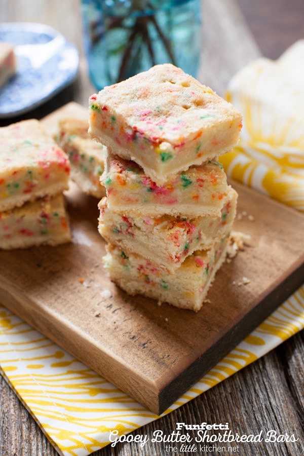 These bars are so gooey and perfect...the sprinkles are a must! Funfetti Gooey Butter Shortbread Bars from thelittlekitchen.net