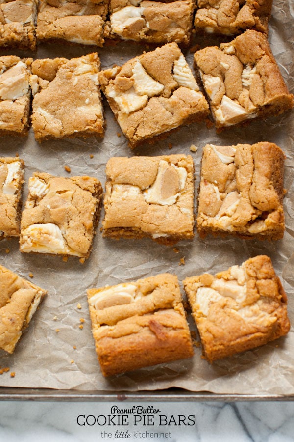 These bars are so easy to make...the crust is made with graham cracker crumbs & I used white chocolate Reese's butter cups! Peanut Butter Cookie Pie Bars from thelittlekitchen.net