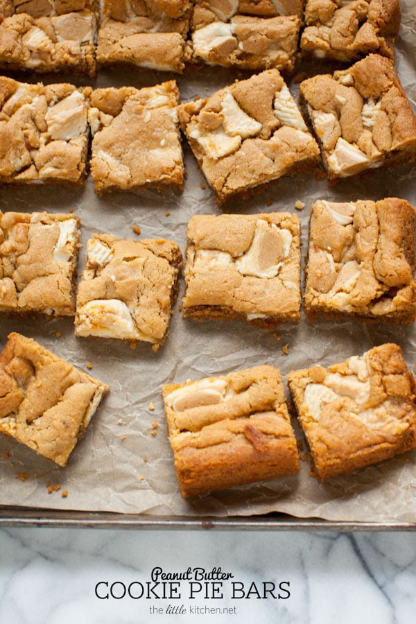 These bars are so easy to make...the crust is made with graham cracker crumbs & I used white chocolate Reese's butter cups! Peanut Butter Cookie Pie Bars from thelittlekitchen.net