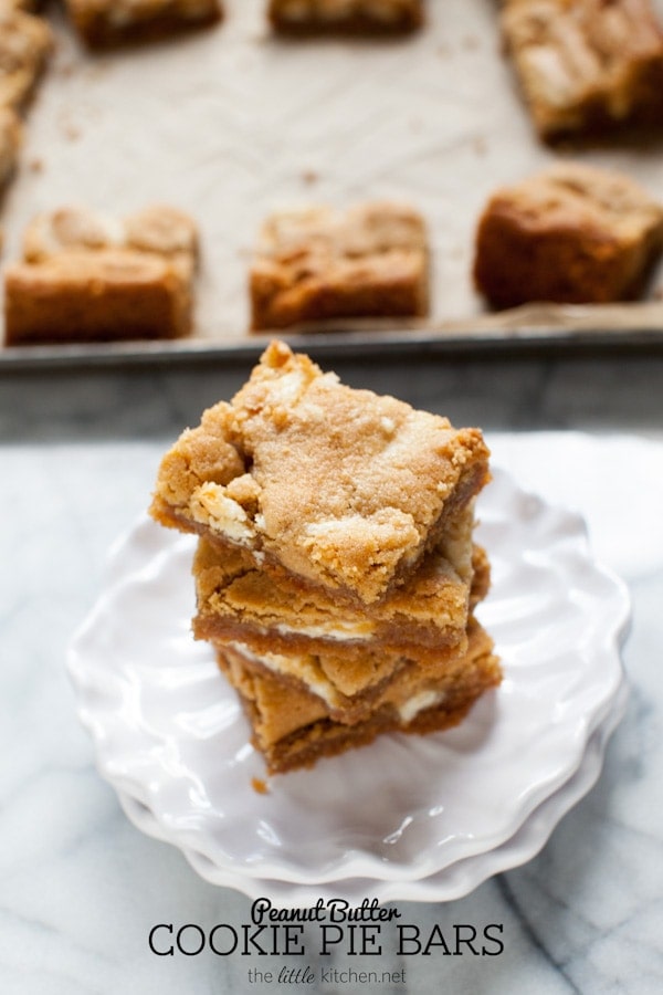 These bars are so easy to make...the crust is made with graham cracker crumbs & I used white chocolate Reese's butter cups! Peanut Butter Cookie Pie Bars from thelittlekitchen.net