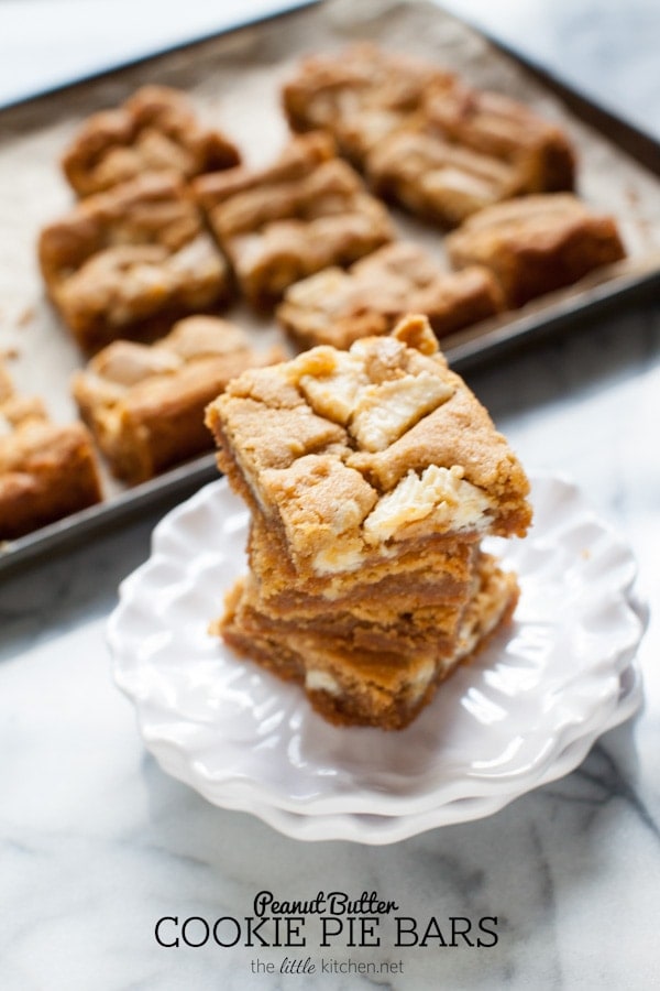 These bars are so easy to make...the crust is made with graham cracker crumbs & I used white chocolate Reese's butter cups! Peanut Butter Cookie Pie Bars from thelittlekitchen.net