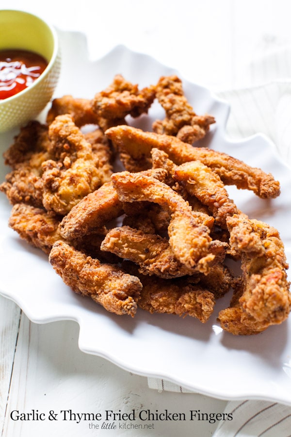 So easy to make and flavorful...this is an elevated fried chicken! Garlic and Thyme Fried Chicken Fingers from thelittlekitchen.net