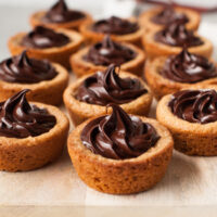 Peanut Butter Cookie Cups with Dark Chocolate Ganache from thelittlekitchen.net