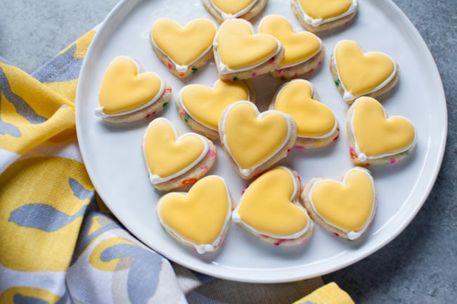 Yellow Heart-Shaped Rainbow Funfetti Cookies from thelittlekitchen.net