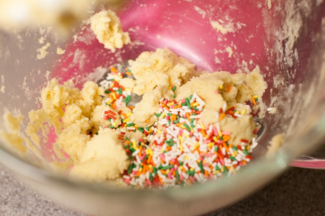 Yellow Heart-Shaped Rainbow Funfetti Cookies from thelittlekitchen.net