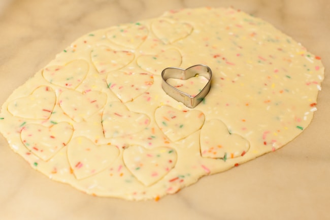 Yellow Heart-Shaped Rainbow Funfetti Cookies from thelittlekitchen.net