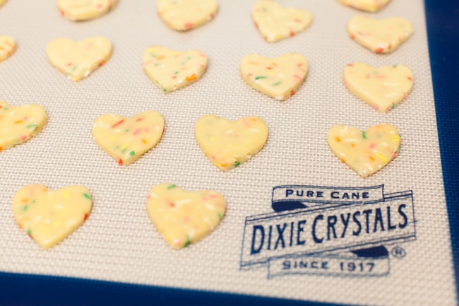 Yellow Heart-Shaped Rainbow Funfetti Cookies from thelittlekitchen.net