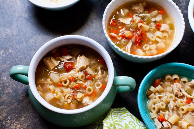 Spicy Chicken Soup in a couple of different shaped and sized bowls
