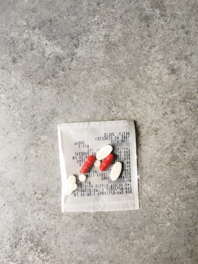 Medications in a plastic bag with writing