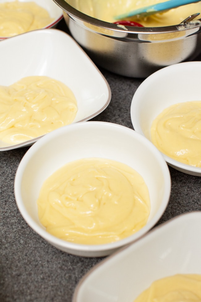 Cake batter divided into separate bowls