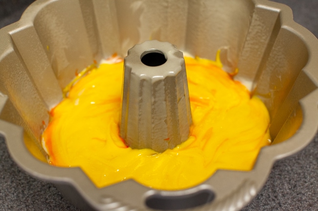 Yellow cake batter in Bundt cake pan