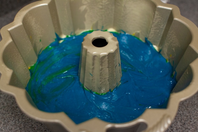 Blue cake batter in Bundt cake pan