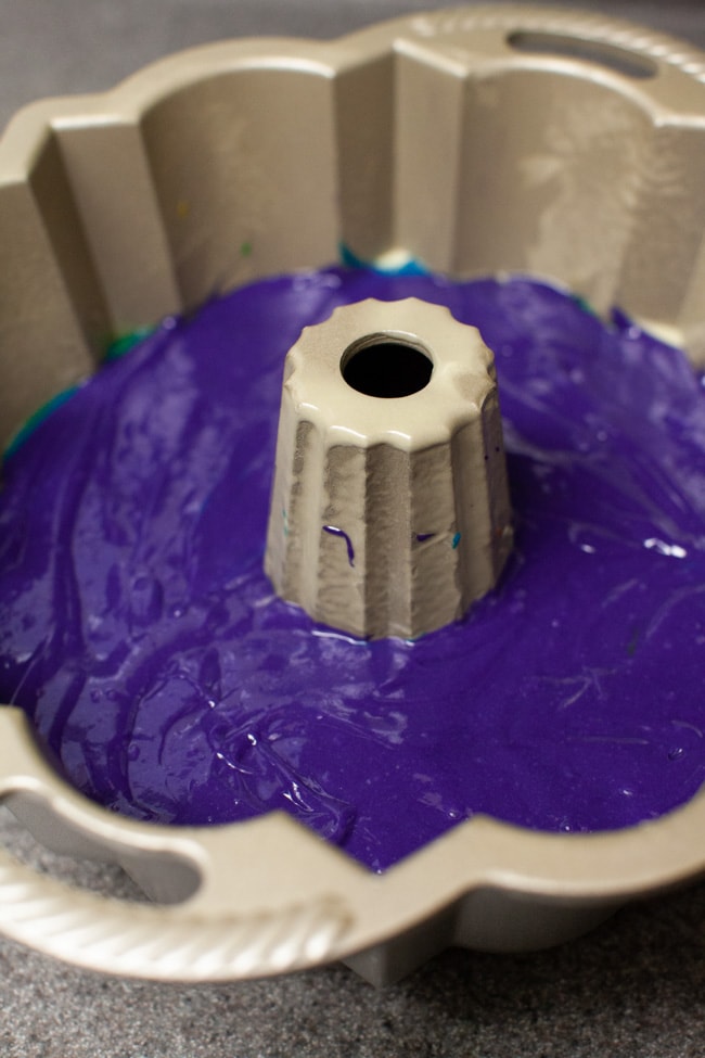 Purple cake batter in Bundt cake pan