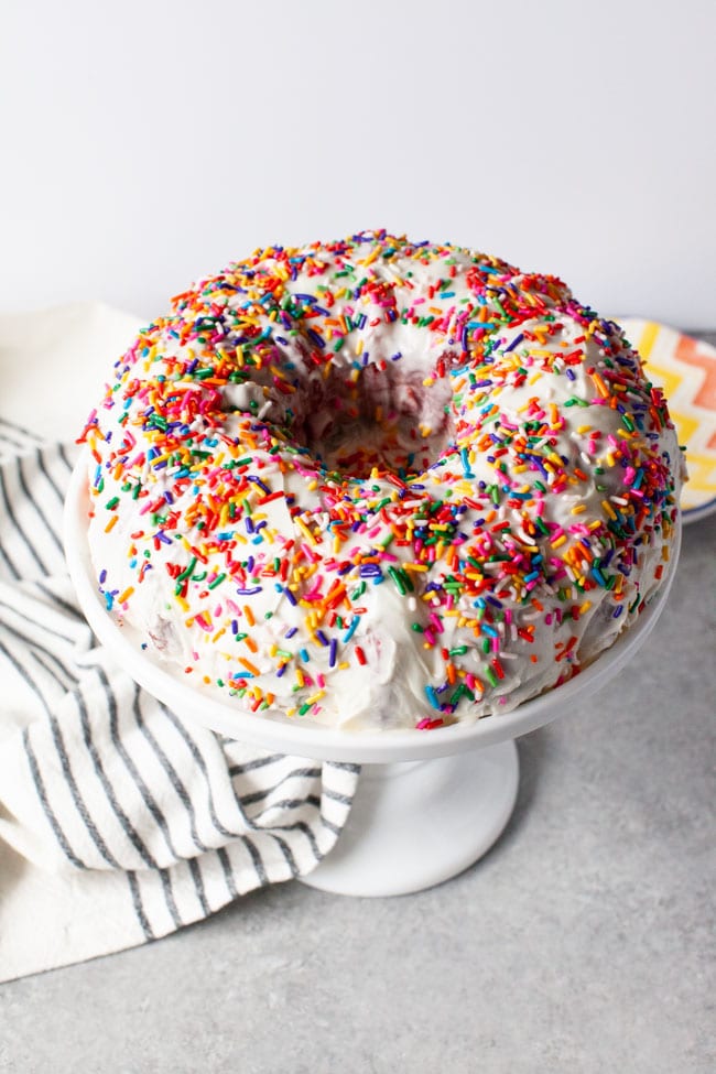 Full Rainbow Bundt Cake on a tray