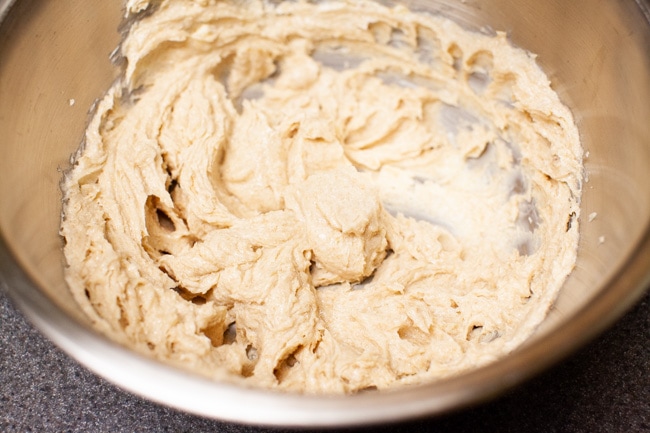 Brown sugar and butter creamed in metal bowl for Matcha Cookies from thelittlekitchen.net