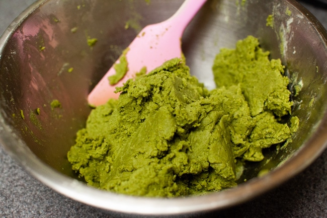 Batter for Matcha Cookies in metal mixing bowl with pink rubber spatula from thelittlekitchen.net