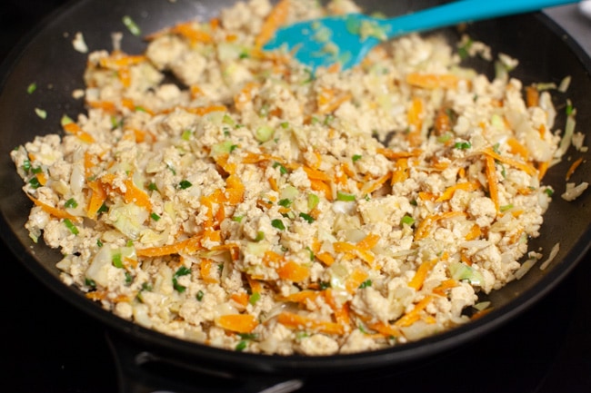 Skillet with Vegetarian Dumpling filling and blue spatula from thelittlekitchen.net