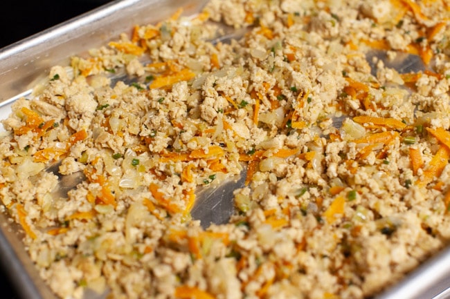 Vegetarian Dumpling filling spread in a thin layer on a baking sheet from thelittlekitchen.net