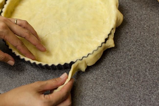 Trimming edges of Sugar Pie crust from edges of tart pan