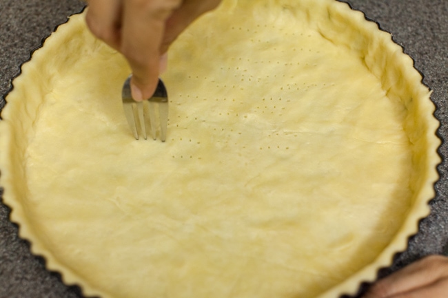Using fork to poke holes in Sugar Pie crust dough