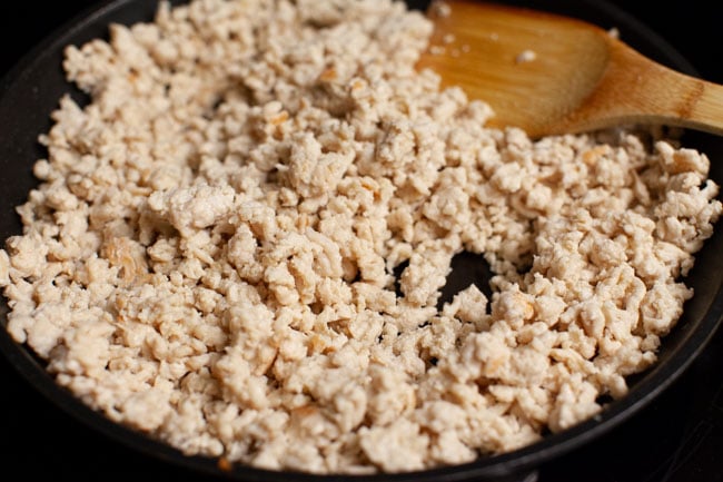 Skillet with ground turkey cooking