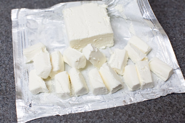 cut up cream cheese for stuffed bagel bites