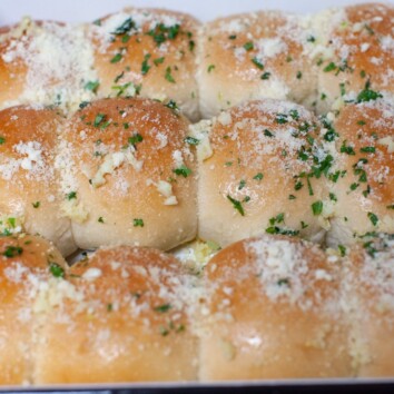 parmesan garlic rolls in a baking dish