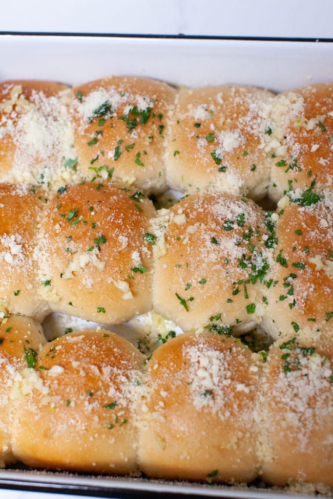 parmesan garlic rolls in a baking dish