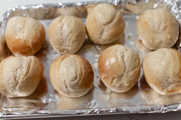 rhodes warm & serve rolls on a baking sheet