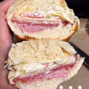 Grinder Salad Sandwich cut open and stacked on top of each other